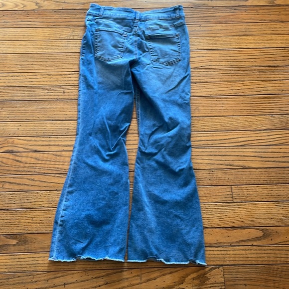 M Jeans. High Rise, Ripped Hem Jean. Flare. Size 12. - Picture 2 of 3